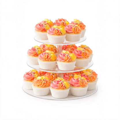 Three-tiered acrylic cupcake stand with cupcakes frosted in pink, yellow, and orange 