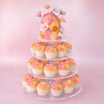 Four-tiered cupcake stand with decorative cupcakes and a 4 inch cake & cupcakes