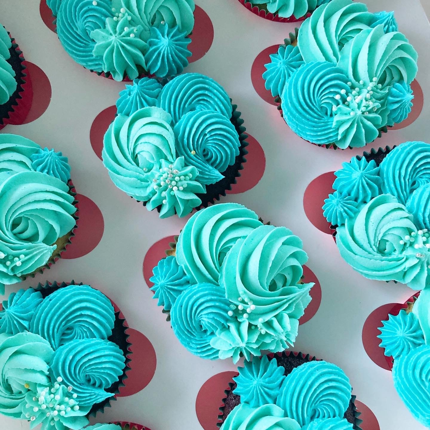 Chocolate Cupcakes with turquoise and blue buttercream frosting 