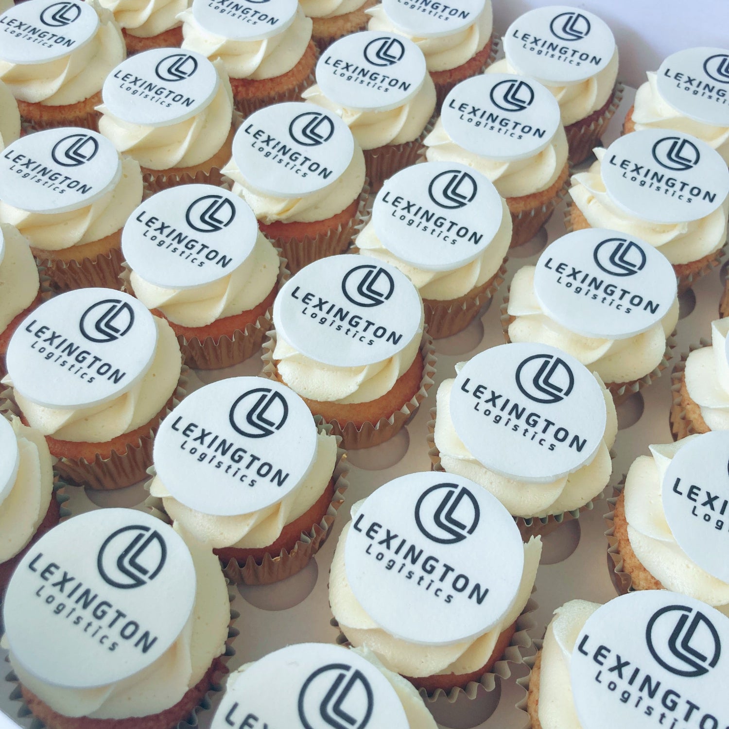 Mini size corporate logo cupcakes with edibile image on fondant topper 