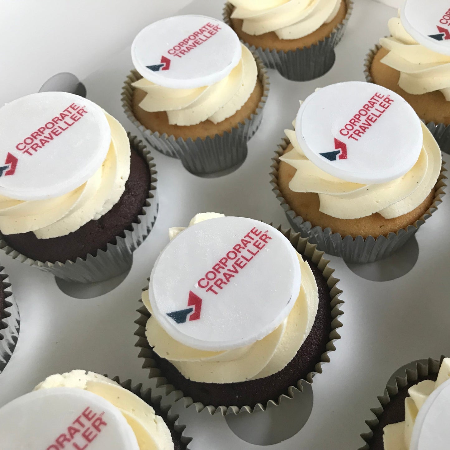 Standard size corporate logo cupcakes with edibile image on fondant topper 