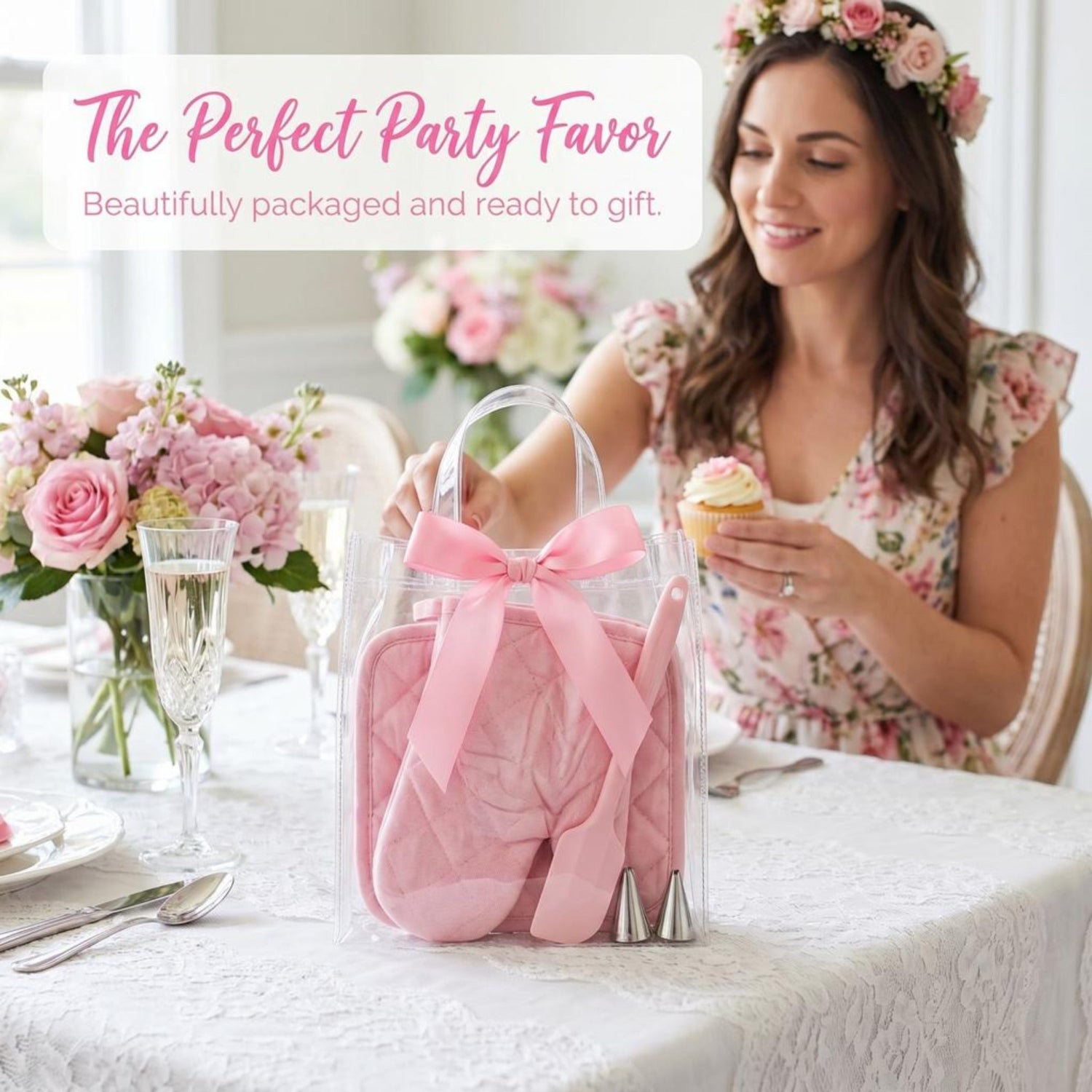 Woman holding a pink party favor bag with flowers and a cupcake