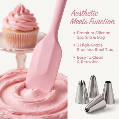 Pink silicone spatula with stainless steel piping tips, used for frosting a pink cupcake.